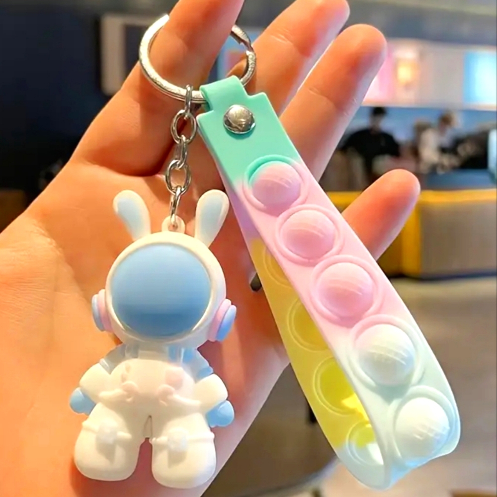 Spaceman Pop Bubble Keychain - Picture 2 of 13